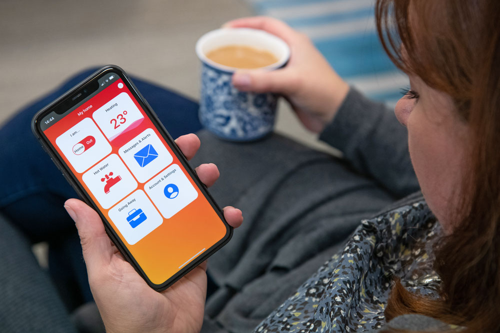 Woman looking at Passiv app on mobile
